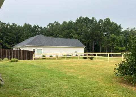 Professional landscaping project by Verdescapes Solutions in Dallas GA with sod and planting bed refresh
