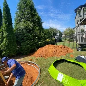 Backyard landscape and border installation project by Verdescapes Solutions in Georgia